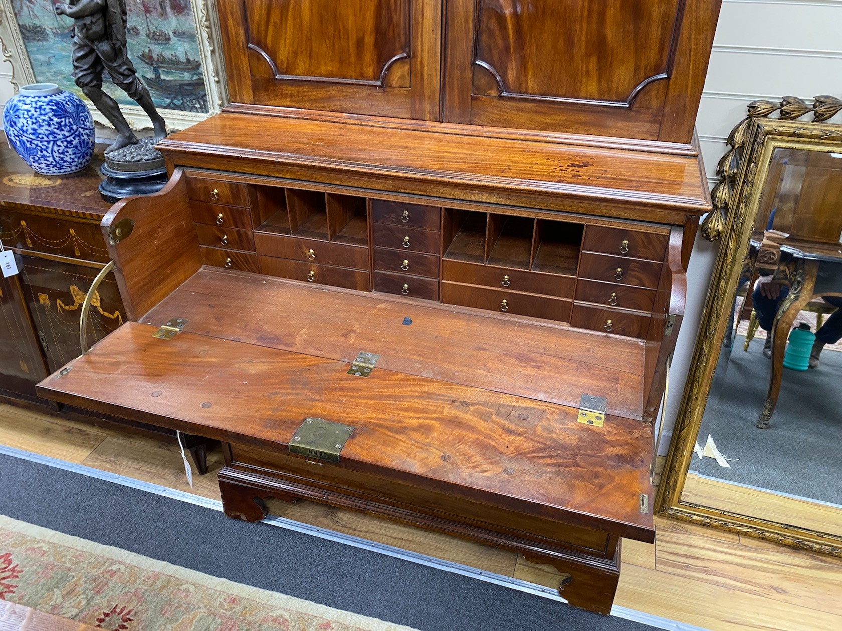 A George III mahogany secretaire cabinet, width 108cm, depth 56cm, height 213cm